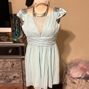 Elegant Light Blue Dress with Embellished Shoulders